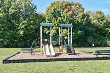 The apartments at Pangea Fields in Indianapolis feature awesome amenities like an outdoor playground!